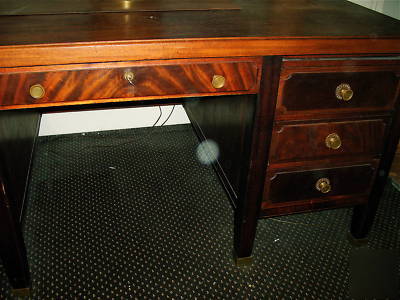 Vintage 1940's 7 drawer mahogany office desk brass trim