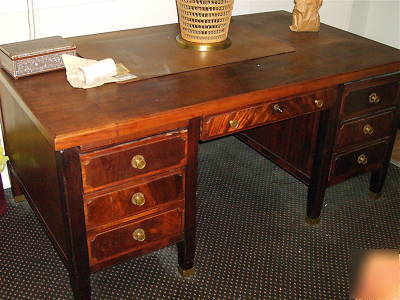 Vintage 1940's 7 drawer mahogany office desk brass trim