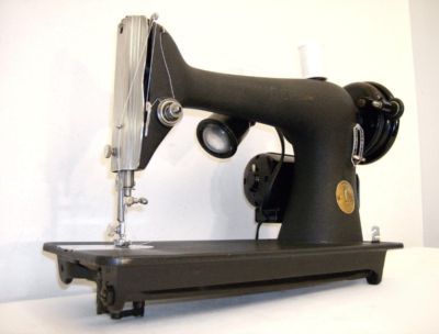 Industrial strength singer sewing machine sews leather