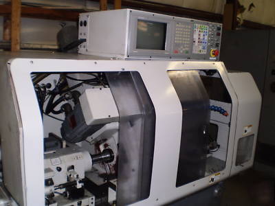 Nomura cnc nn-13TB 4 axis swiss type lathe 