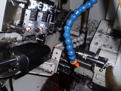Nomura cnc nn-13TB 4 axis swiss type lathe 