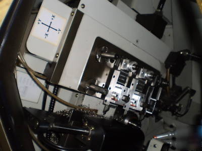 Nomura cnc nn-13TB 4 axis swiss type lathe 