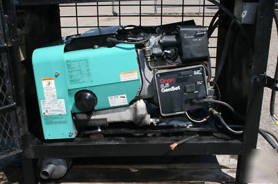 6.5KW onan generator 120/240 3 phase w/ housing