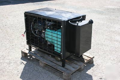 6.5KW onan generator 120/240 3 phase w/ housing