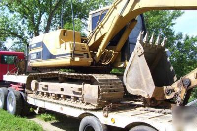 1994 peterbilt 1997 cat 312B 1980 freuhaff 
