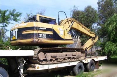1994 peterbilt 1997 cat 312B 1980 freuhaff 