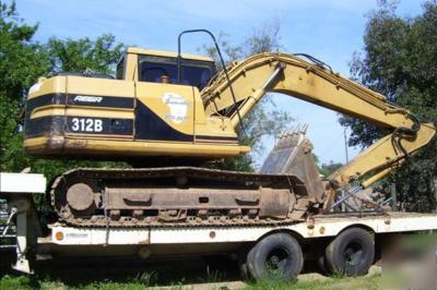1994 peterbilt 1997 cat 312B 1980 freuhaff 