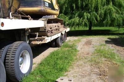1994 peterbilt 1997 cat 312B 1980 freuhaff 