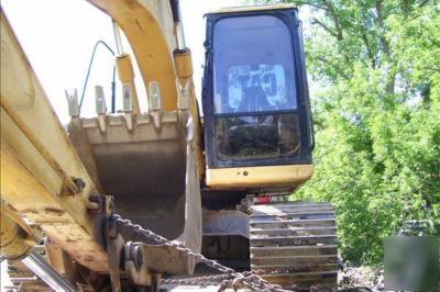 1994 peterbilt 1997 cat 312B 1980 freuhaff 